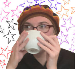 A she/they sipping tea, surrounded by stars in as many colors as the internet would give me for free.