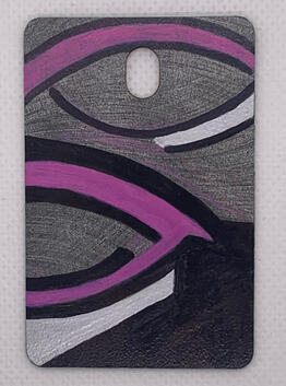 Unlike the other paintings, the wooden canvas has been left partially unpainted. It is an understated silver. Atop it are eyes, shaped in black, then lined with purple and bright silver like eyeshadow.